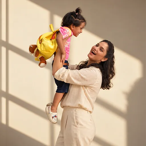 A warm, caring moment between a mother and her prenatal care team
